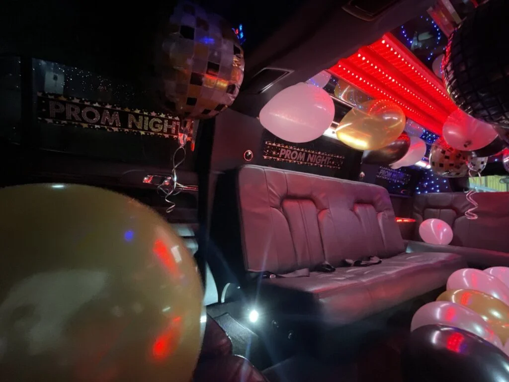 Prom Night decorations and balloons on the limousine leather seating