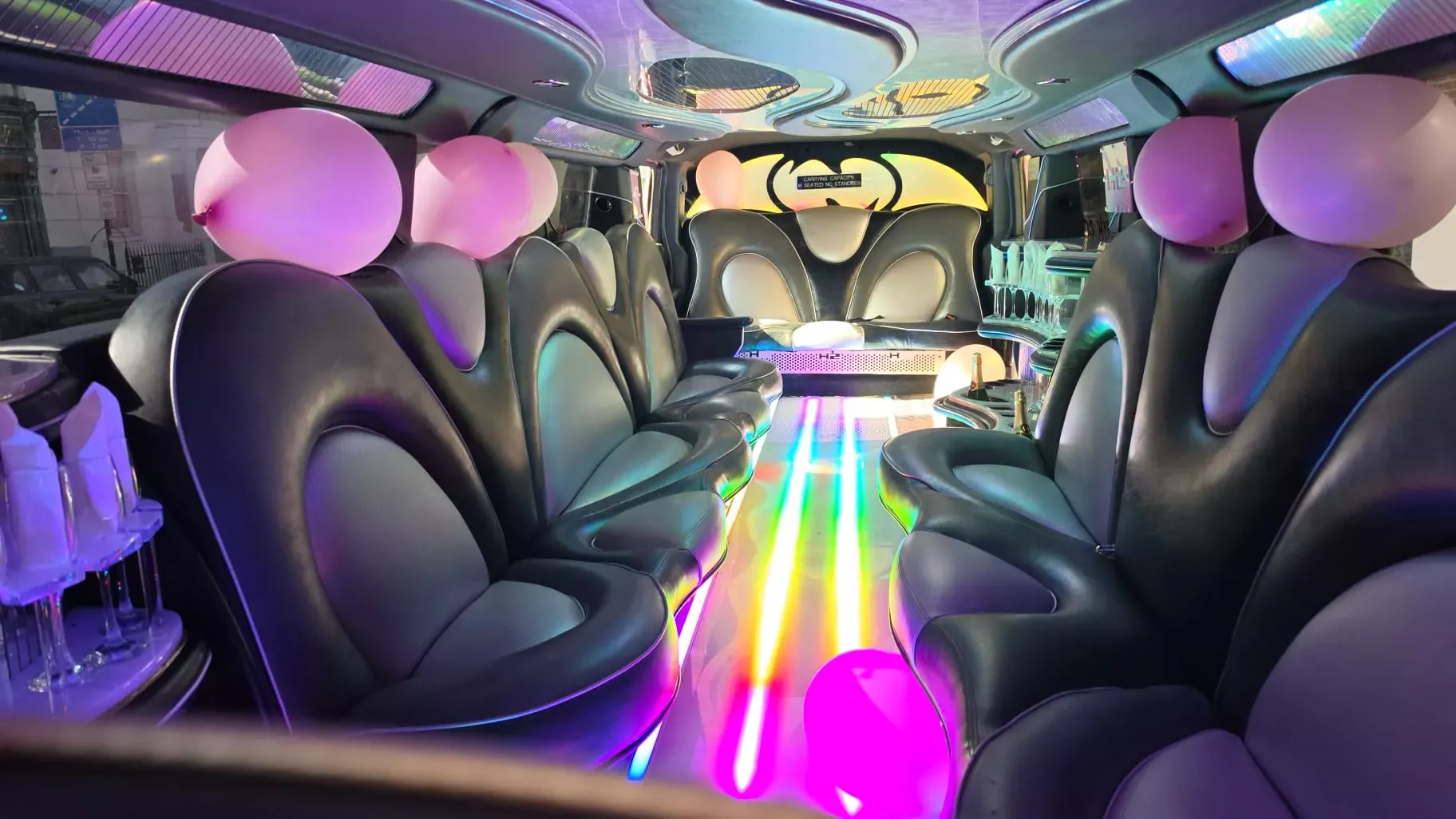Inside the Starlite pink Hummer limousine
