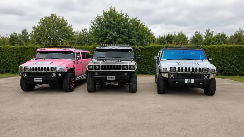 Three Starlite Hummer stretch limousines lined up head on